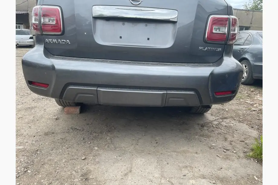 Nissan Armada 2016-2024 Hintere Stoßstange komplett (Original 2019) Image