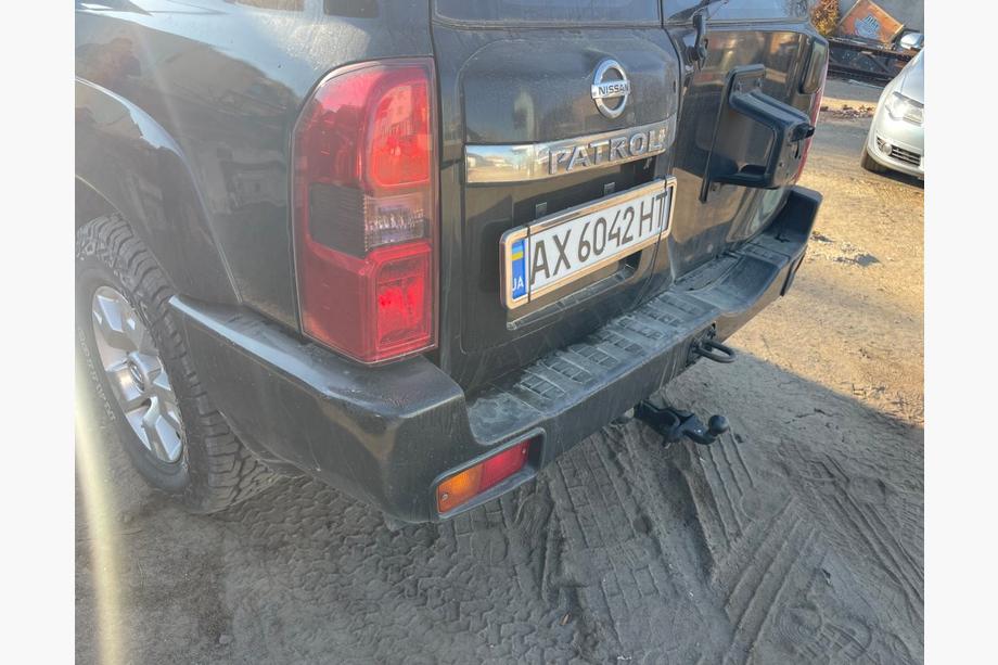 Nissan Patrol Y61 1997-2011 Hintere Stoßstange komplett gebraucht (2004-2008) Image