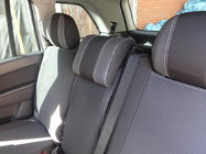 Opel Zafira B 2005–2011 Autositzbezüge (Kunstleder↗Stoff, Premium) Foto 1