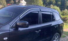 Hyundai Santa Fe 2 2006-2012 Windabweiser mit Chromleiste (4 Stk, Niken) Foto 1