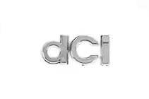 Renault Megane III 2009-2016 Emblem DCI 908894256R (55mm x 24mm) Foto 1
