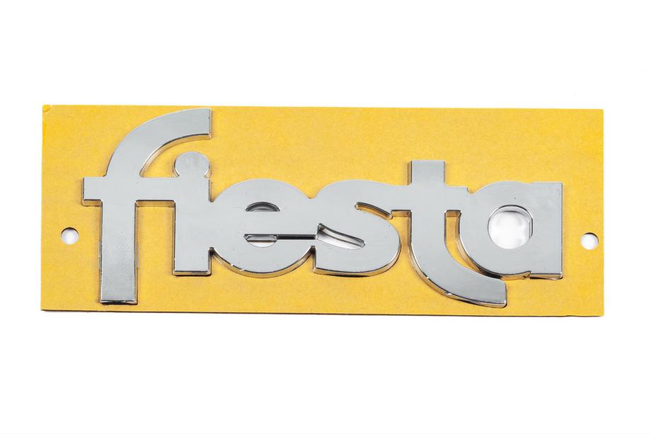 Ford Fiesta 1995-2001 Schriftzug Fiesta YS61B42528AA (117mm x 52mm) Foto 1
