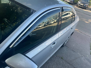 Skoda Rapid 2012-2019 Windabweiser mit Chromleiste Niken Luxury (4 Stk) Foto 1