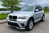 BMW X5 E70 2007-2013 Frontstoßstangenlippe (2010-2013, grundiert zum Lackieren) Foto 1