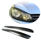 Volkswagen Golf 6 2008-2014 Scheinwerferblenden (für HB 2010-2013, Carbon) Foto 1