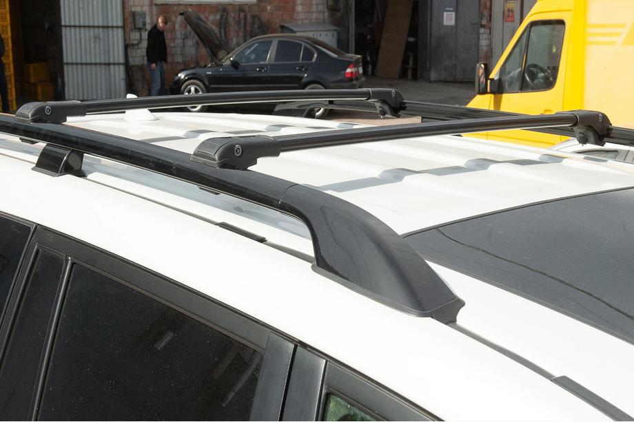 Kia Carnival 2021- Dachträger (Querträger) für normale Reling abschließbar WingBar V1 (2 Stk) bis 110 cm, Schwarz Foto 5