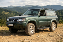 Nissan Patrol Y61 1997-2011 Trittbretter Allmond Black (2 Stk., Aluminium) Foto 1