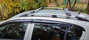 Opel Astra H 2004-2013 Dachträger für normale Reling abschließbar (2 Stk) Foto 1