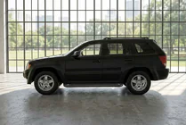 Jeep Grand Cherokee WK 2004-2010 Trittbretter Allmond Black (2 Stk., Aluminium) Foto 1