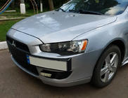 Mitsubishi Lancer X 2008- Kennzeichenhalter (Kunststoff) Grundiert zum Lackieren Foto 1