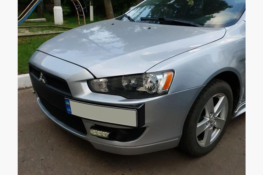 Mitsubishi Lancer X 2008- Kennzeichenhalter (Kunststoff) Grundiert zum Lackieren Image