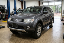 Mitsubishi Pajero Sport 2008-2015 Trittbretter Allmond Black (2 Stk., Aluminium) Foto 1