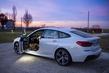 Eine dreitürige liftbek BMW 6-Series Gran Turismo Foto 8
