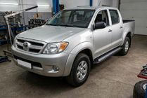 Toyota Hilux 2006-2015 Seitenschweller New Vision Black (2 Stk., Aluminium) Foto 1