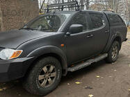 Mitsubishi L200 2015-2024 Seitenstufen Dakar V2 mit LED (2015-2019, 2 Stk, Metall) Foto 1