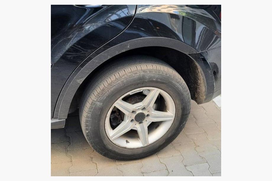 Mercedes ML W164 2005-2011 Kotflügelverbreiterungen (4 Stk, schwarz, ABS-Kunststoff) Foto 2