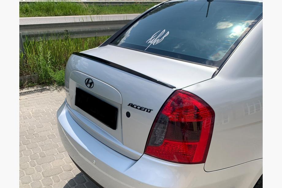 Hyundai Accent 2006-2010 Heckspoiler LIP (Sunplex, schwarz) (115,8cm x 6,3cm) Foto 1